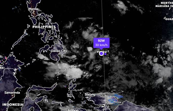 Bibit siklon tropis 92W berkembang di Palau, Sabtu (26/3). GAMBAR: ZOOM EARTH